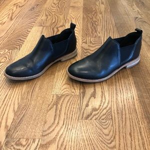 Clark’s brand black leather ankle bootie